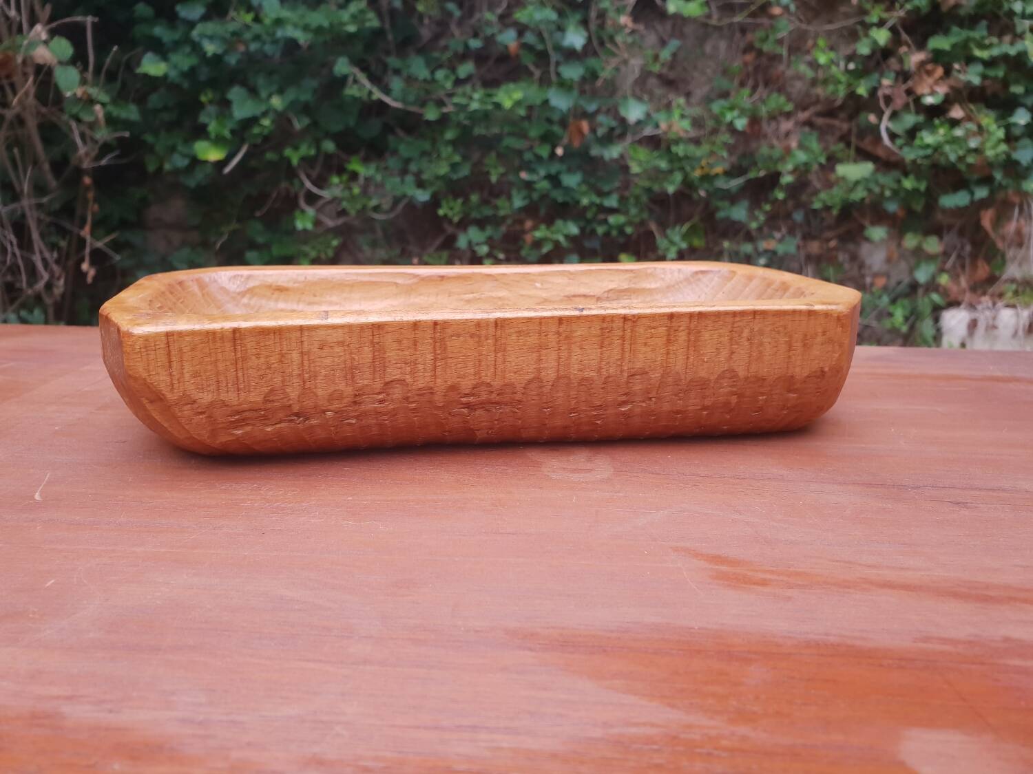 Vintage wooden pocket emptier