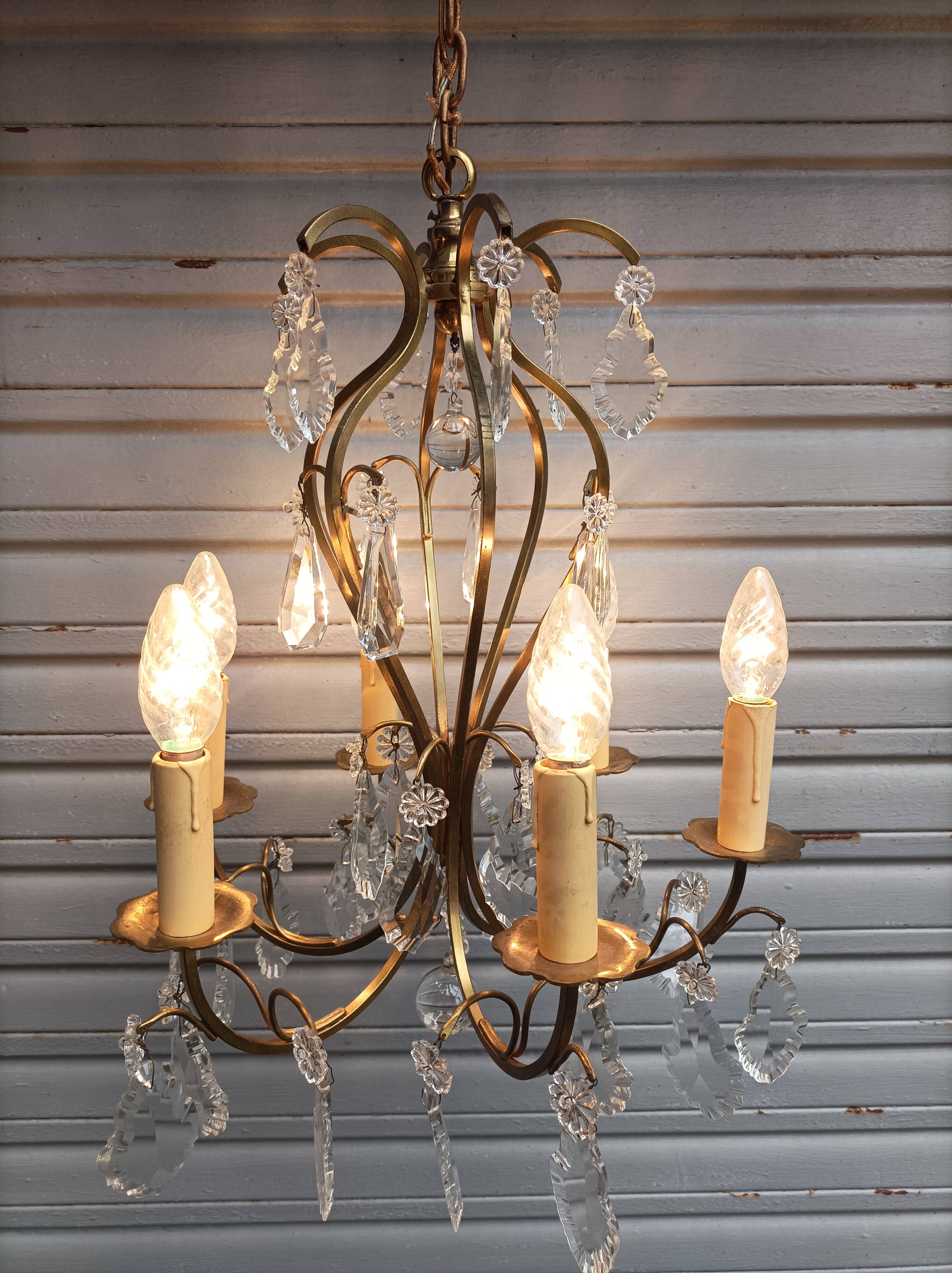 Remarkable 6-light cage chandelier with crystal pendants, complete and in working order.
