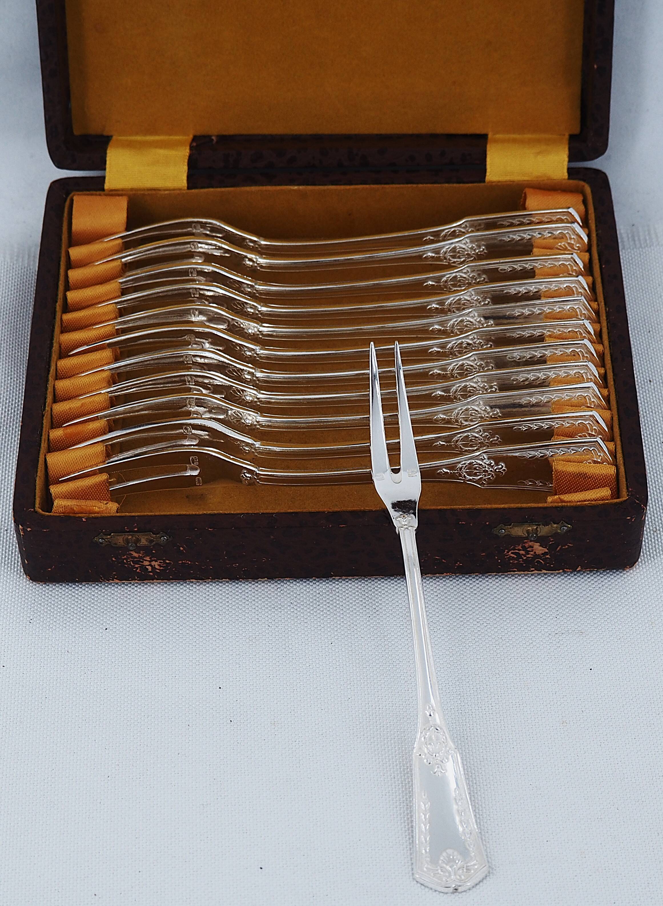 Sfam Empire Without Restraint, 12 snail forks, seafood in silver-plated metal.