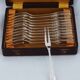 Sfam Empire Without Restraint, 12 snail forks, seafood in silver-plated metal.