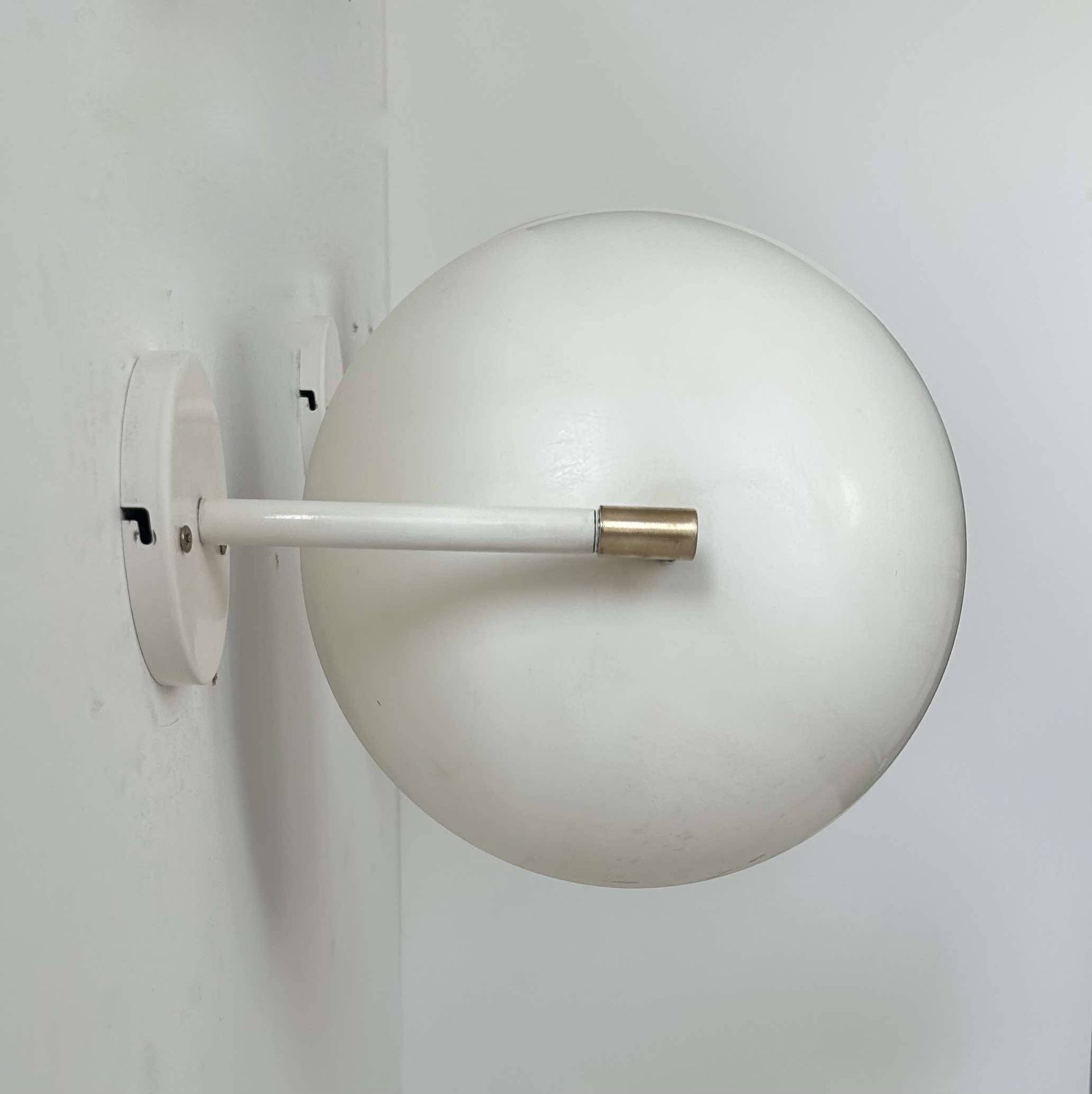 Pair of vintage adjustable wall lights, brass and white metal, France 1970