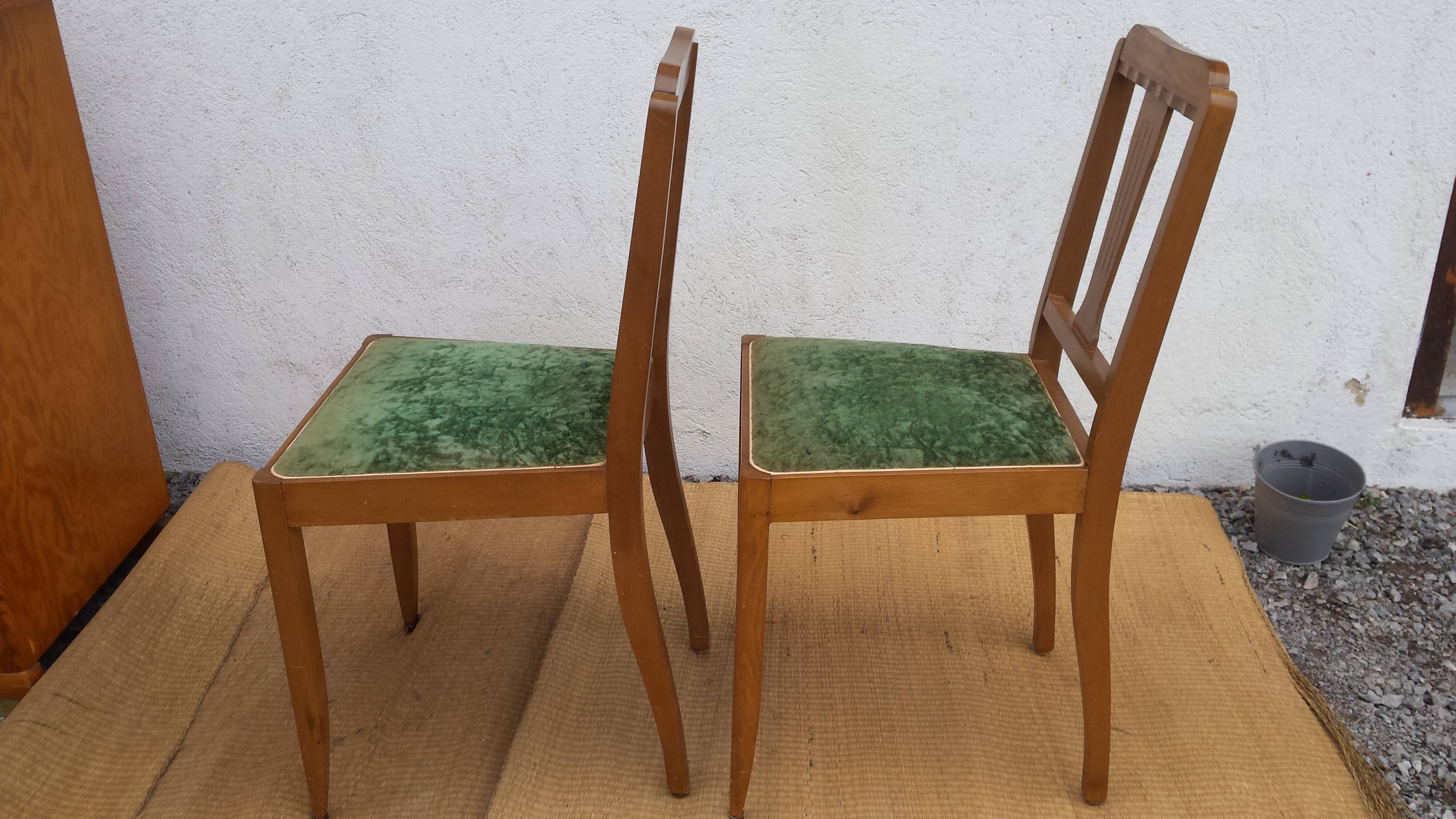 lot of 2 wooden chairs and green velvet