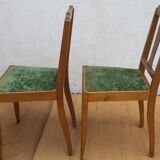 lot of 2 wooden chairs and green velvet