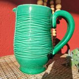 Green glazed ceramic pitcher