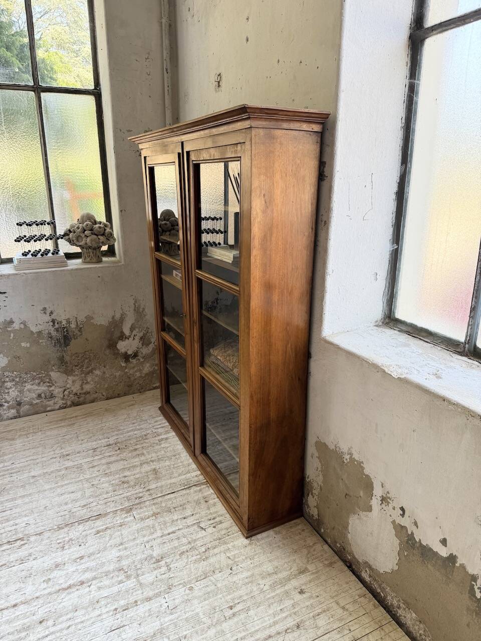 Glass-fronted walnut library 1900