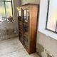 Glass-fronted walnut library 1900