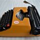 Brother deluxe 262tr orange mechanical typewriter