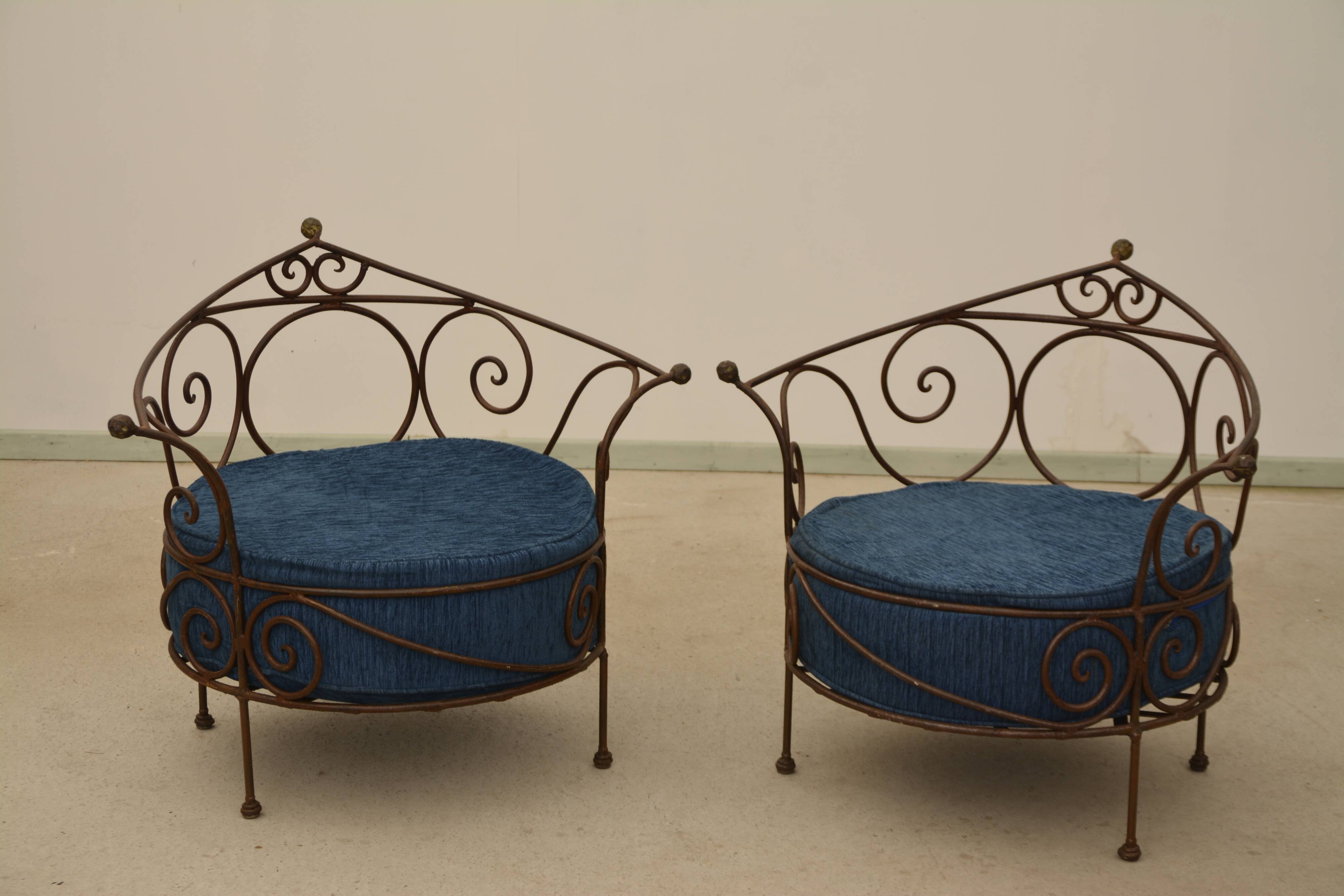 Wrought iron armchairs