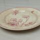 Plat rond en terre de fer de Gien modèle Aubépine rose