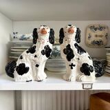 Pair of black Cavalier King Charles dogs in Staffordshire pottery, 19th century.