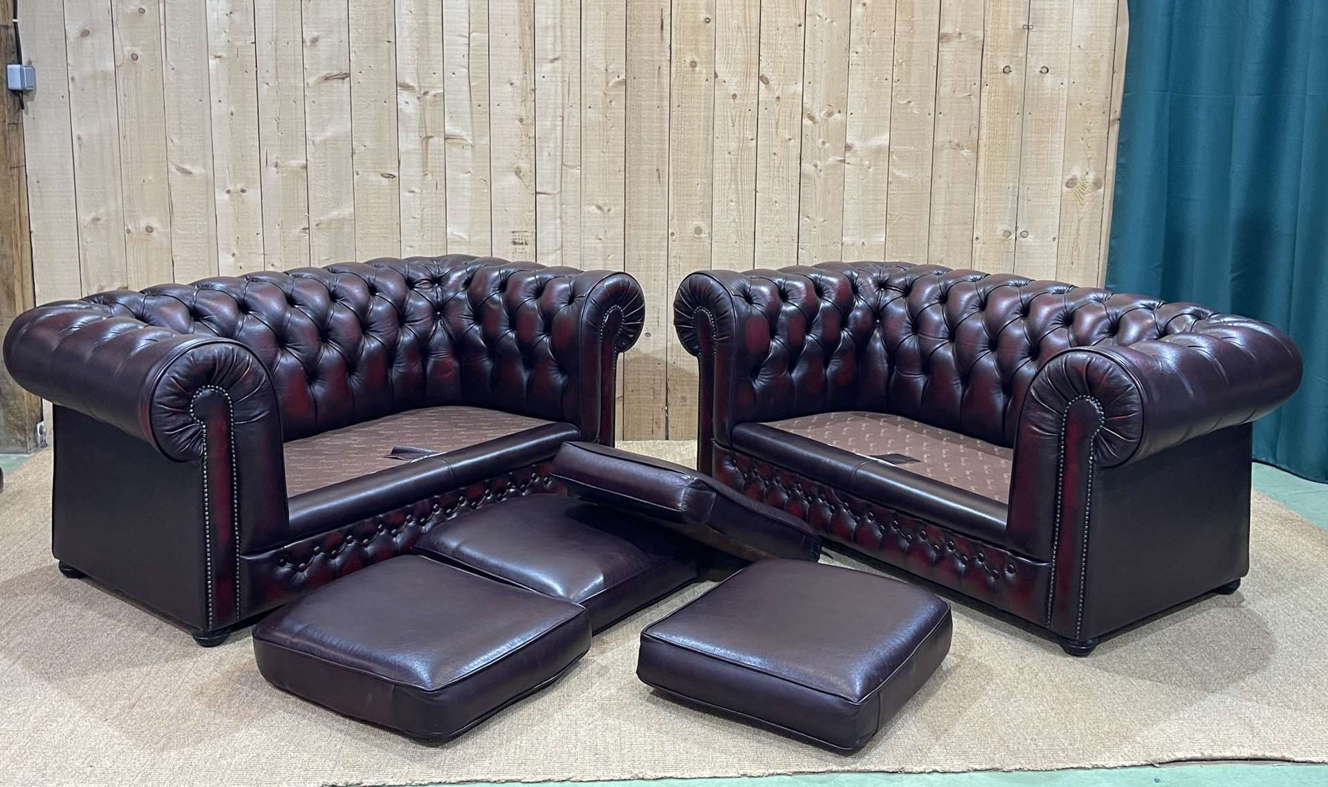 Pair of 2-seater leather Chesterfield sofas from the 1990s by Thomas LLOYD
