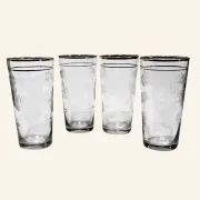 Four engraved crystal glasses from La Granja, with gilded edges, early 20th century.