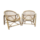 A pair of rattan armchairs