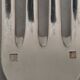 Antique silver-plated monogrammed cutlery set