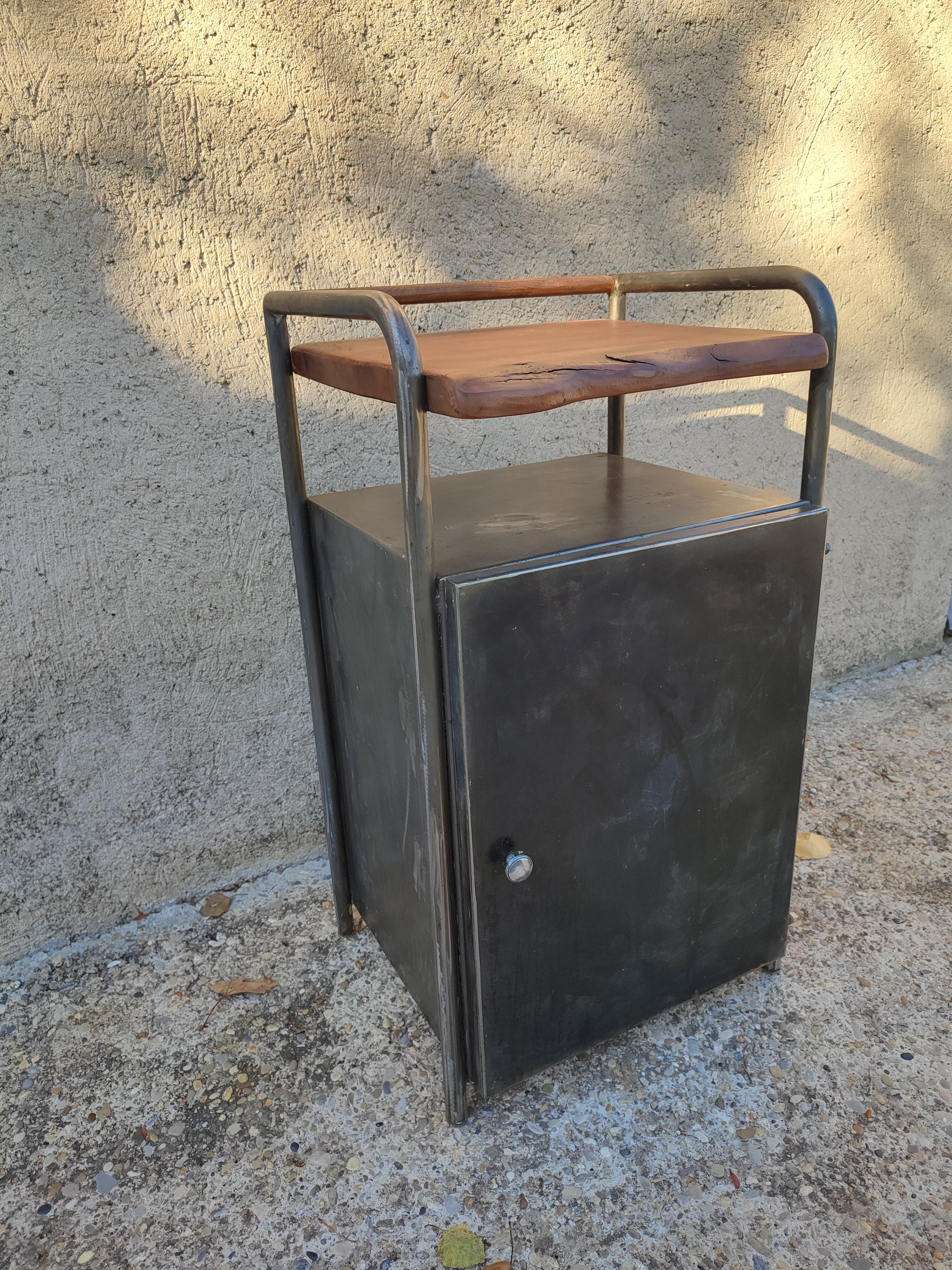 Small vintage piece of furniture in black metal