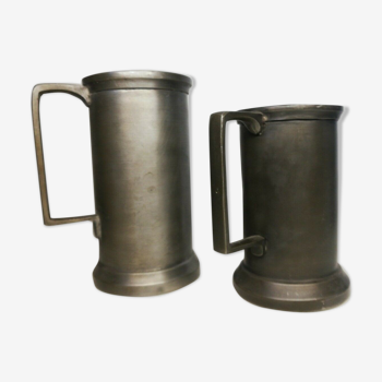 Set of 2 tin pitchers