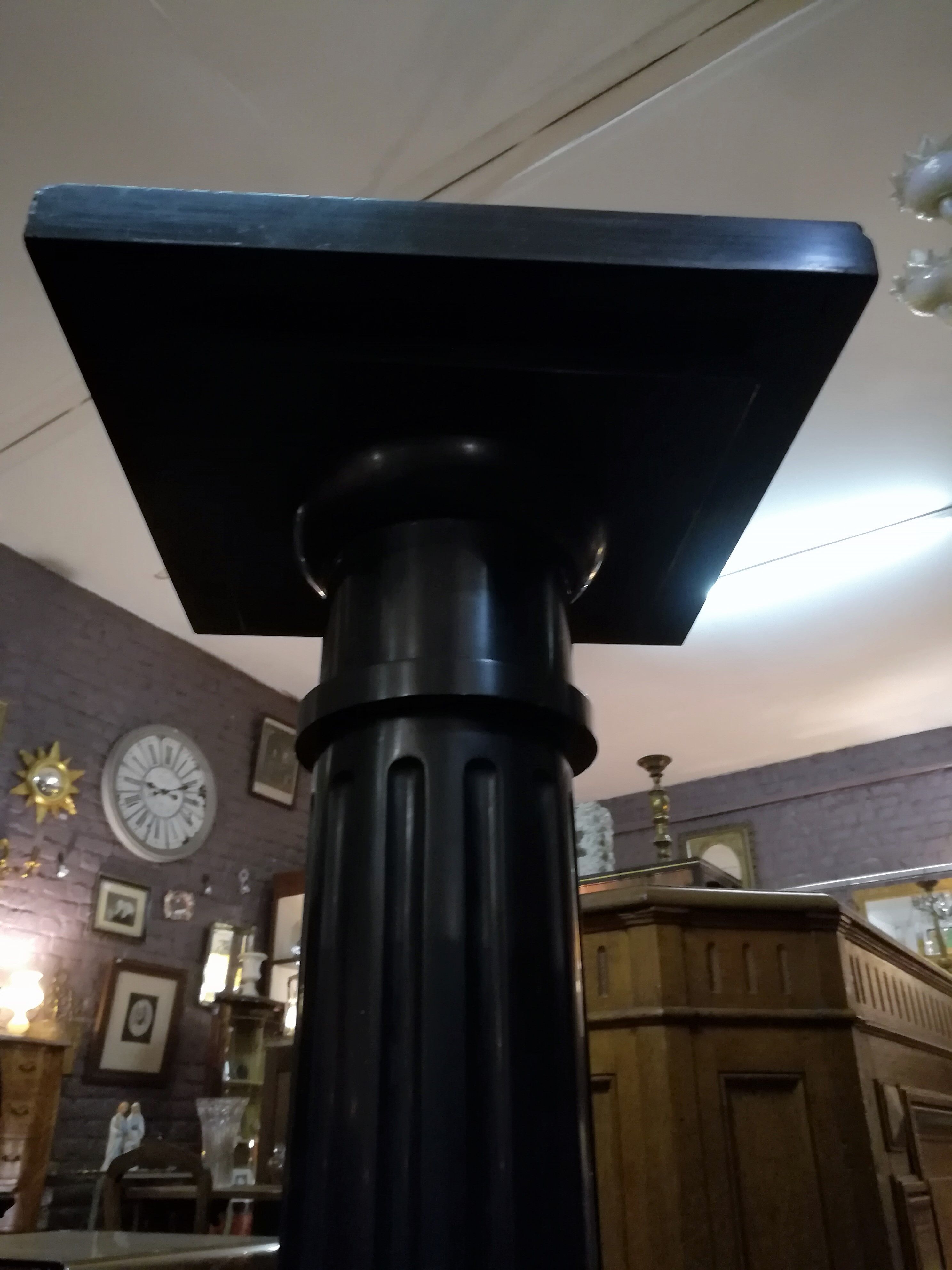 Black marble column