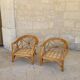 Two large rattan armchairs