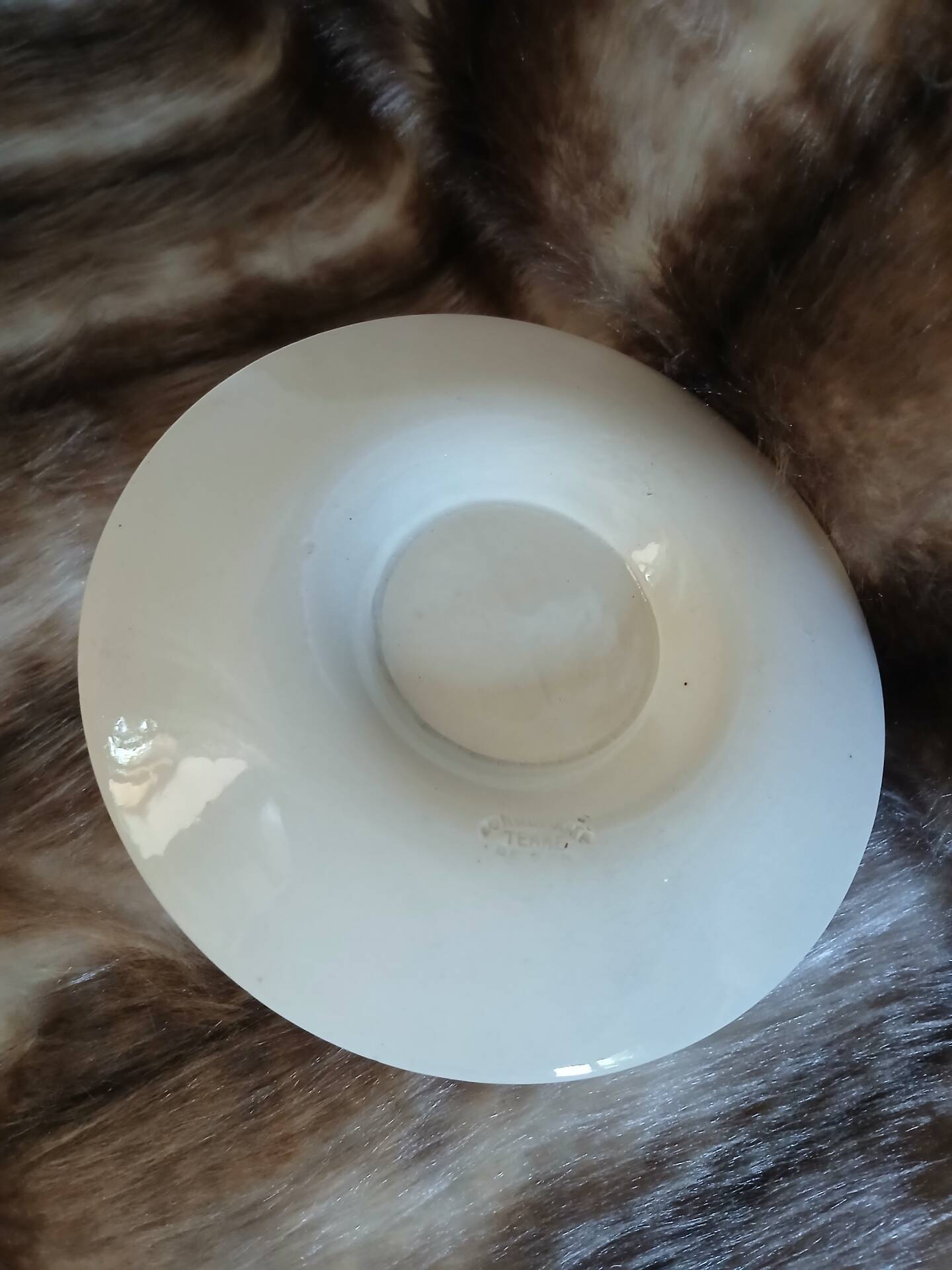Antique sauce boat in Longchamp ironstone.