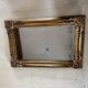 Miroir Louis XV, glace au mercure et bois doré, XIXe