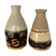 Artisanal sandstone form bottles