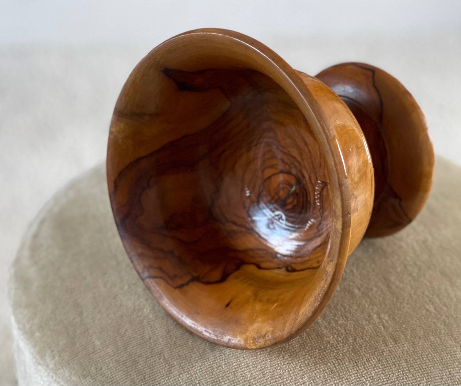 Empty pocket in olive wood