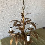Golden vintage chandelier with leaf decoration