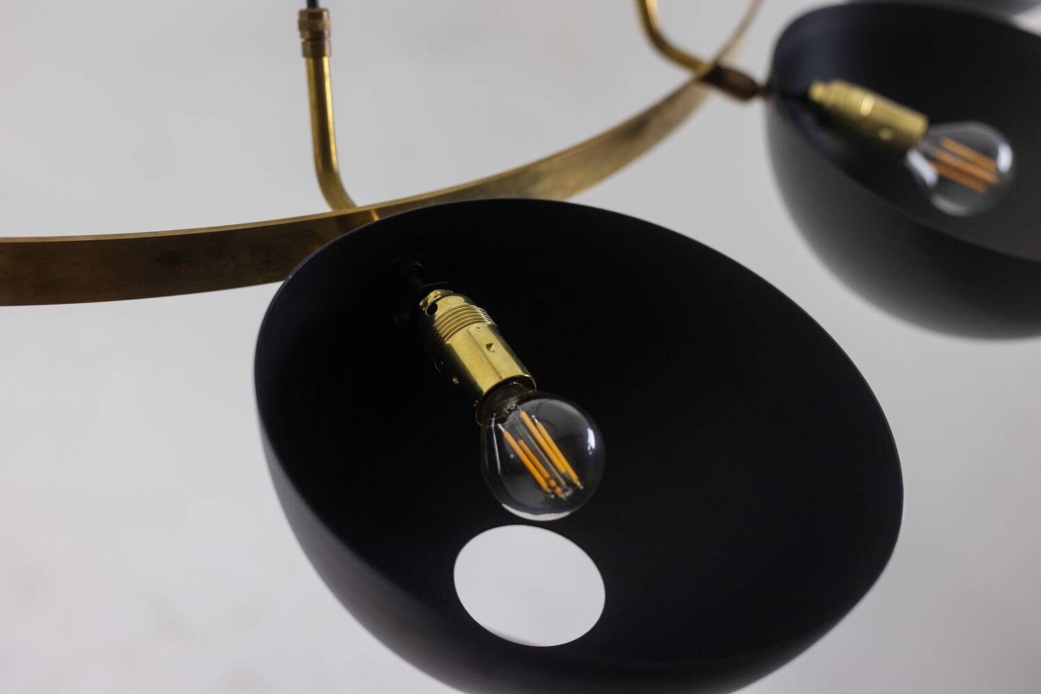 Contemporary 10-light chandelier or pendant light, brass and black lacquer