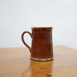 Vintage pitcher in glazed terracotta