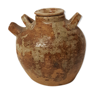 Pot with lid and double sandstone handle