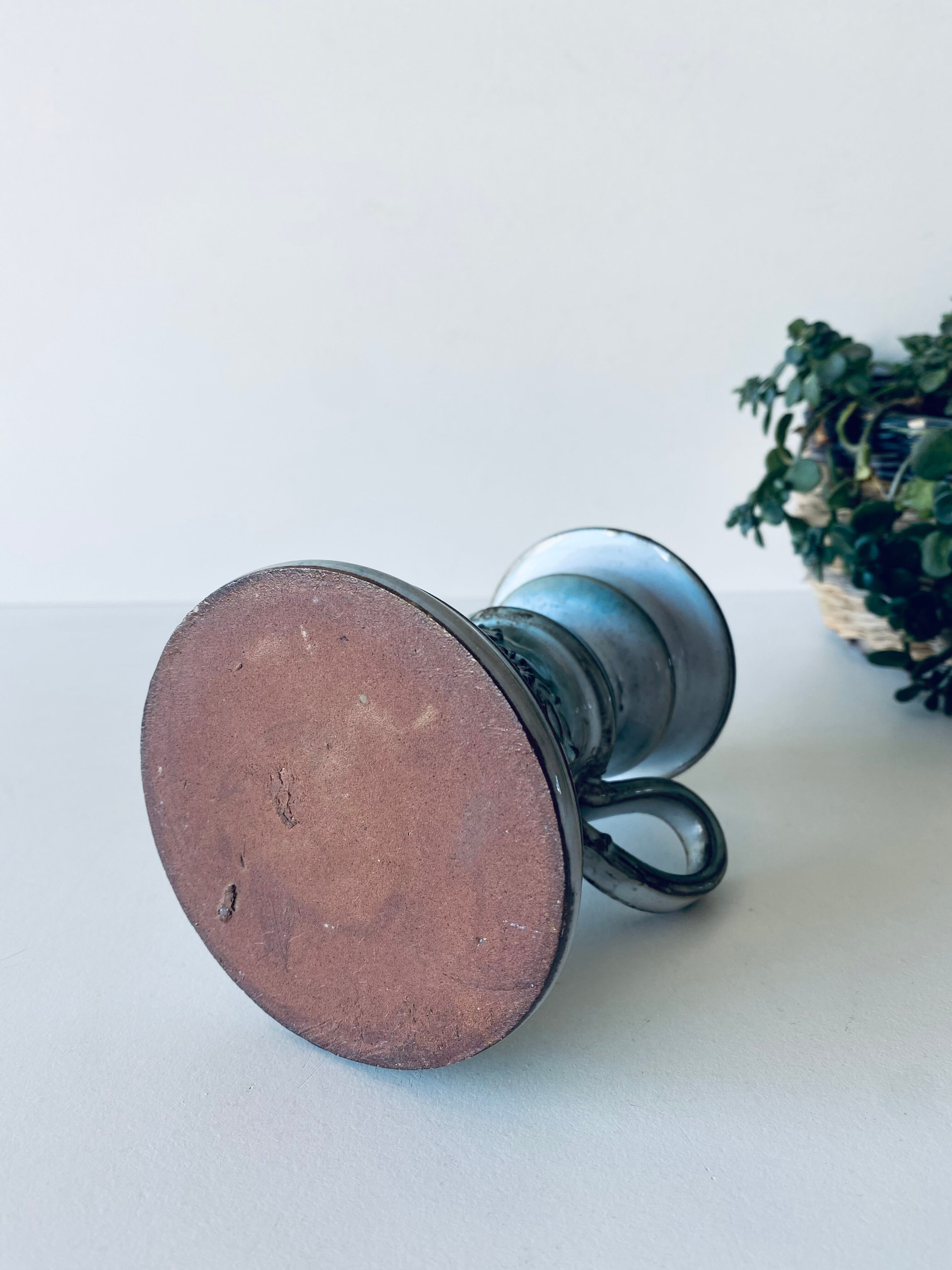 Enamelled ceramic candle holder