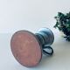 Enamelled ceramic candle holder
