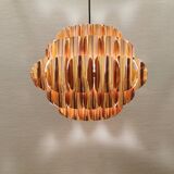 Copper colored hanging lamp. designed by thorsten orrling sweden