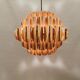 Copper colored hanging lamp. designed by thorsten orrling sweden