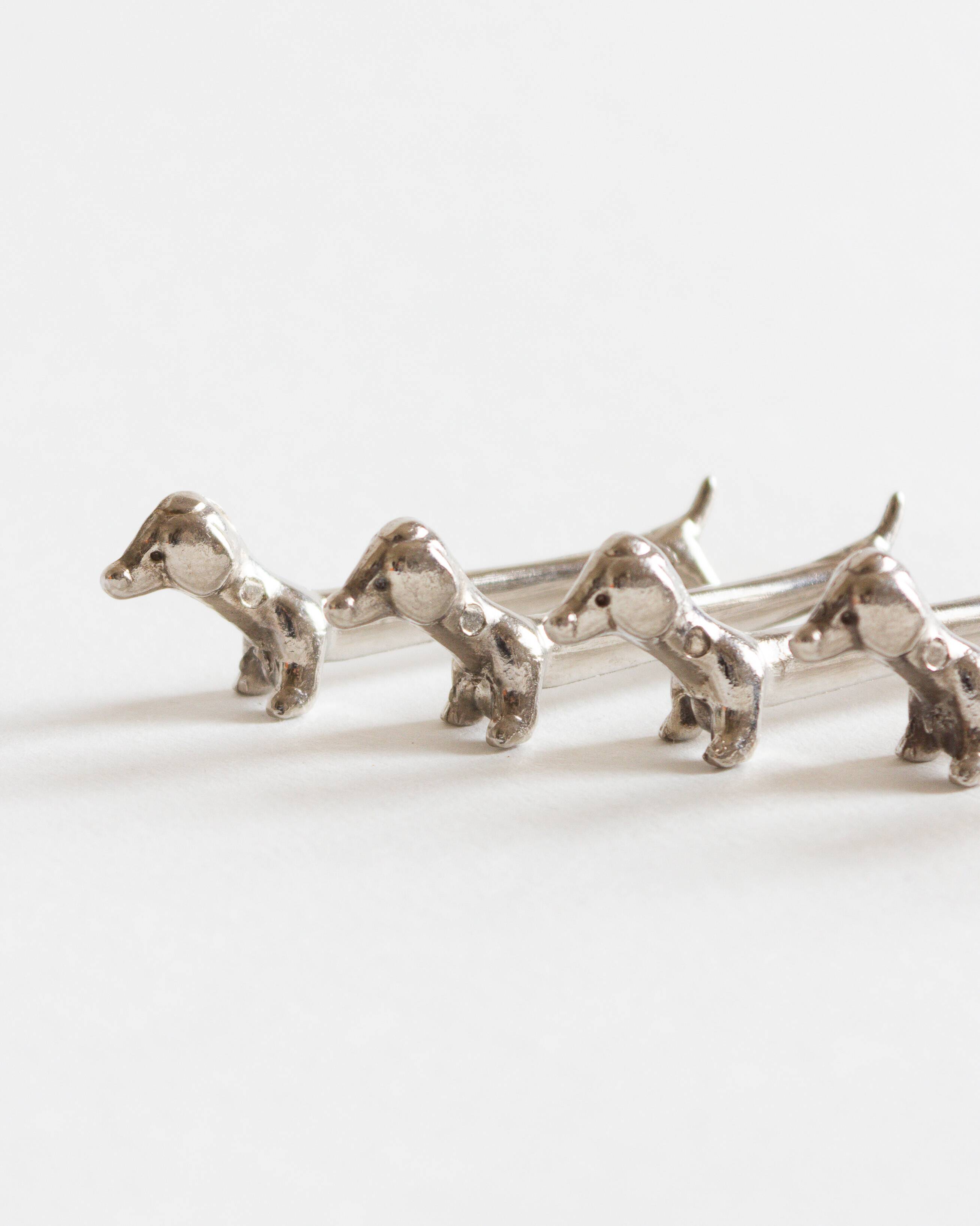 Set of six dachshund-shaped knife holders, 1970s