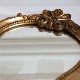 Small golden mirror in baroque style
