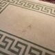 White and green rectangular rug