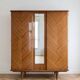 Retro wooden veneer wardrobe: 3 doors with mirror and tapered legs.