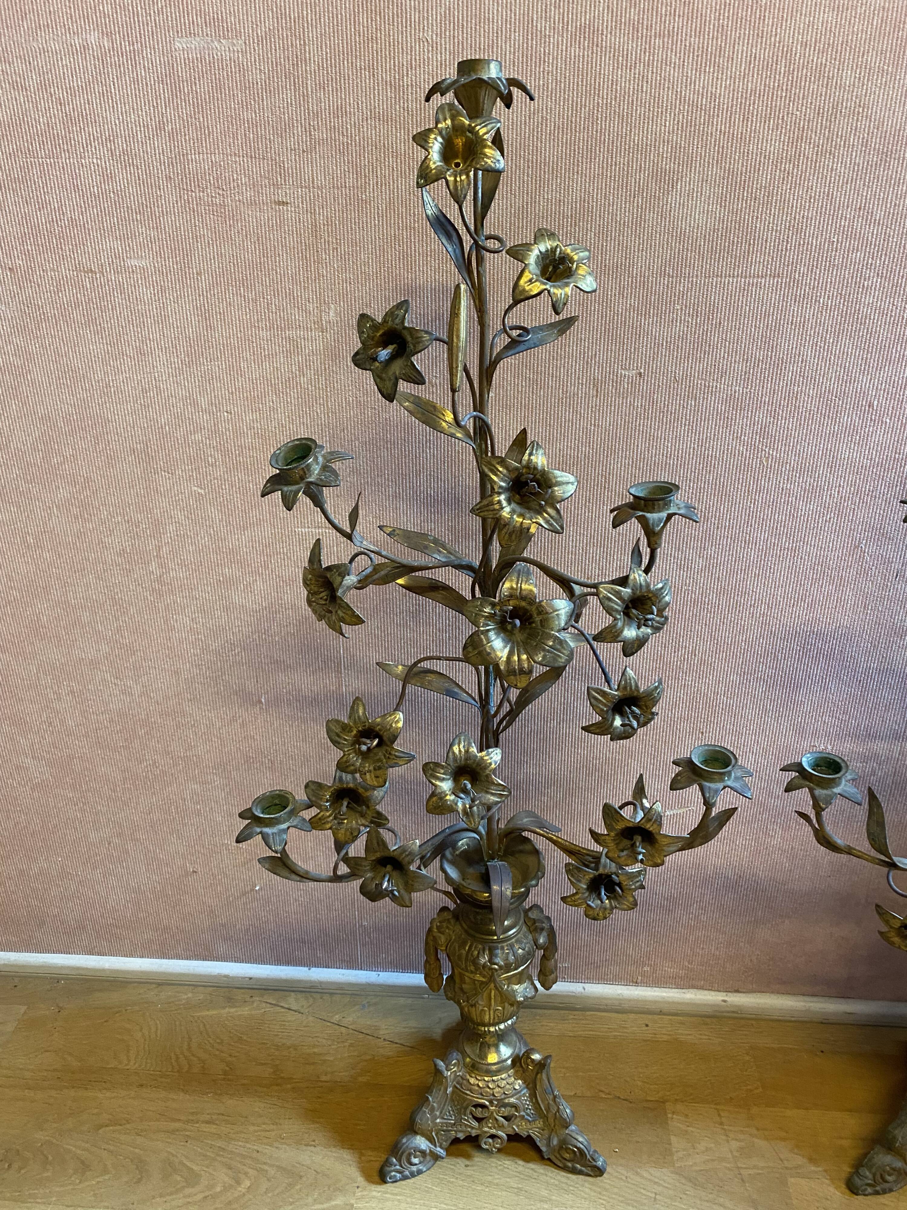 Pair of gilded bronze church candelabras.