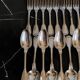 24 silver-plated metal table settings in the filet model.
