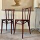 2 bistro chairs in arched and dark wood