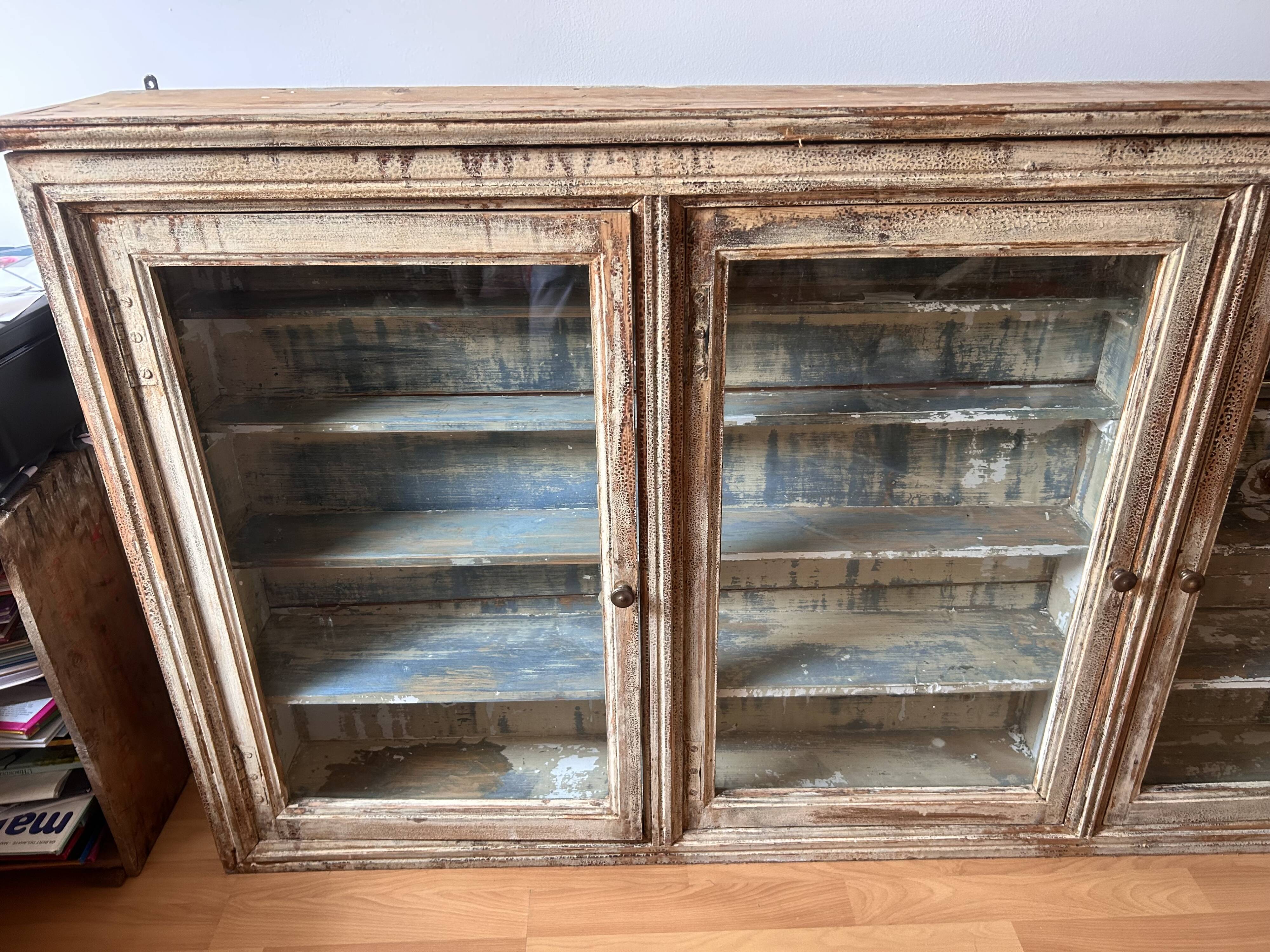 Old wooden shop display case to hang from the early 20th century.