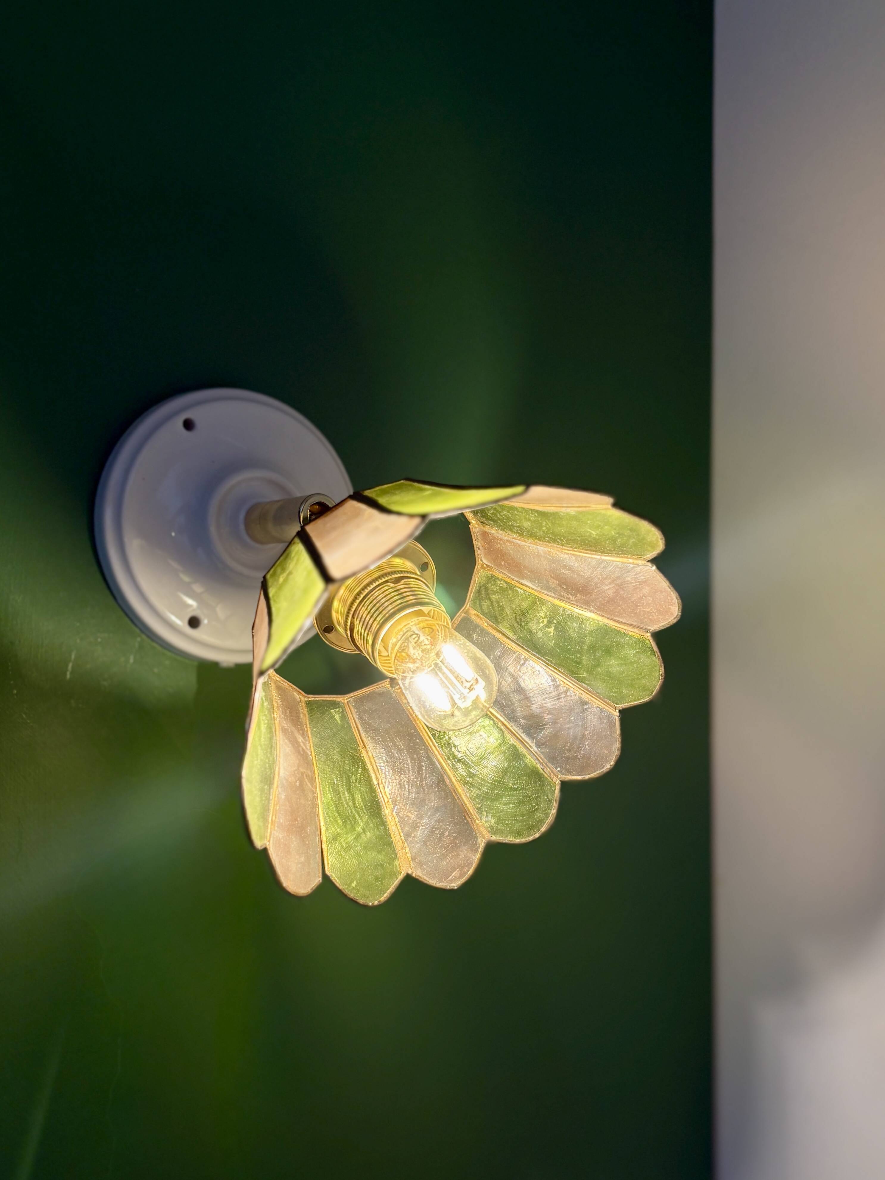 Vintage wall lamp with a green and pink mother-of-pearl lampshade