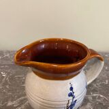 Decorated stoneware carafe