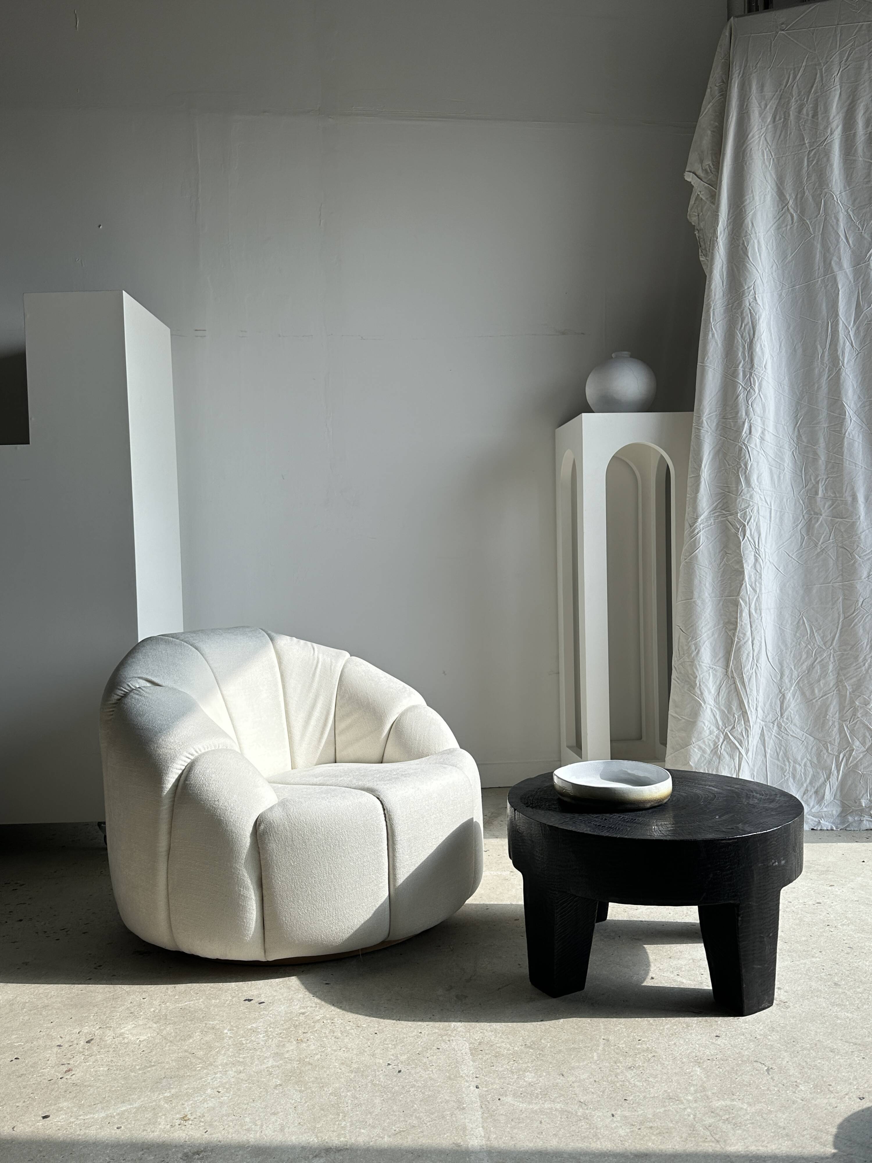 Large white circular armchair, white fabric upholstery