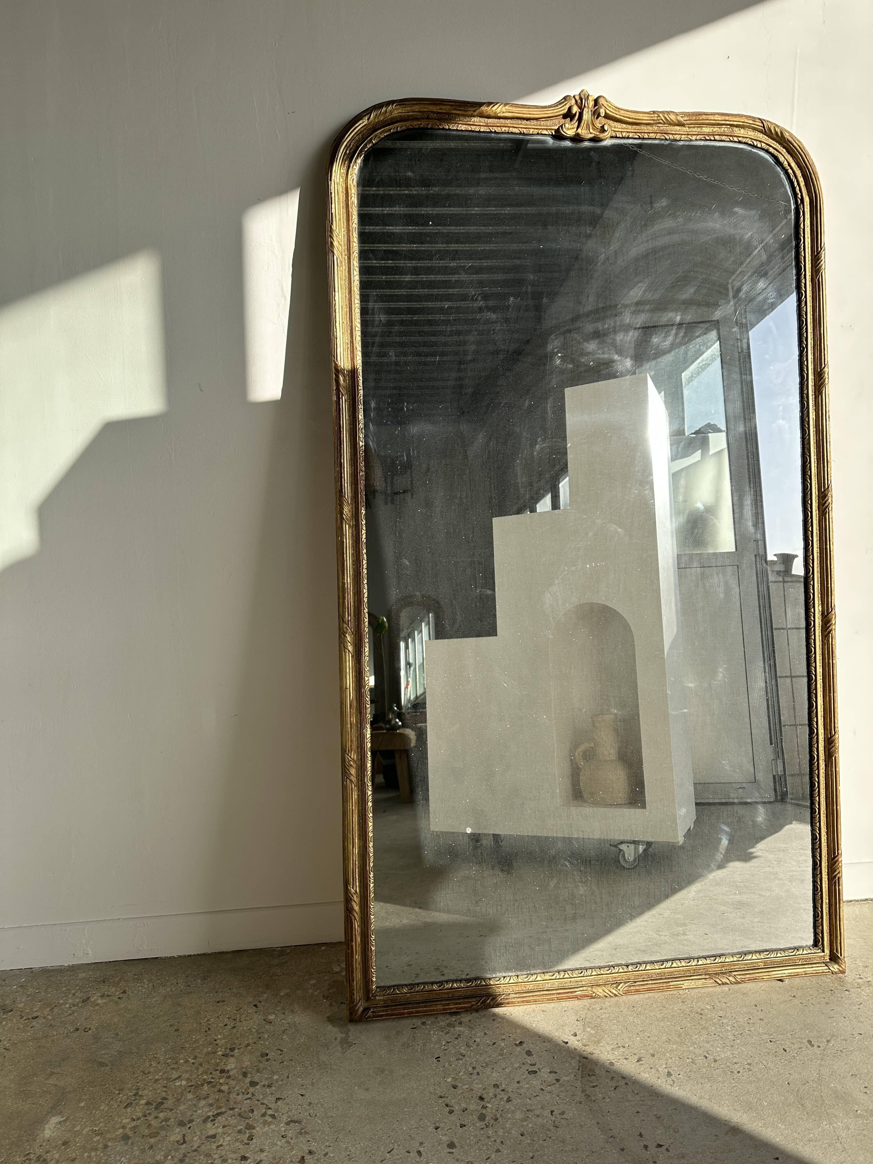 Large gilded mirror 19th century rounded corners mercury glass Louis XVI style