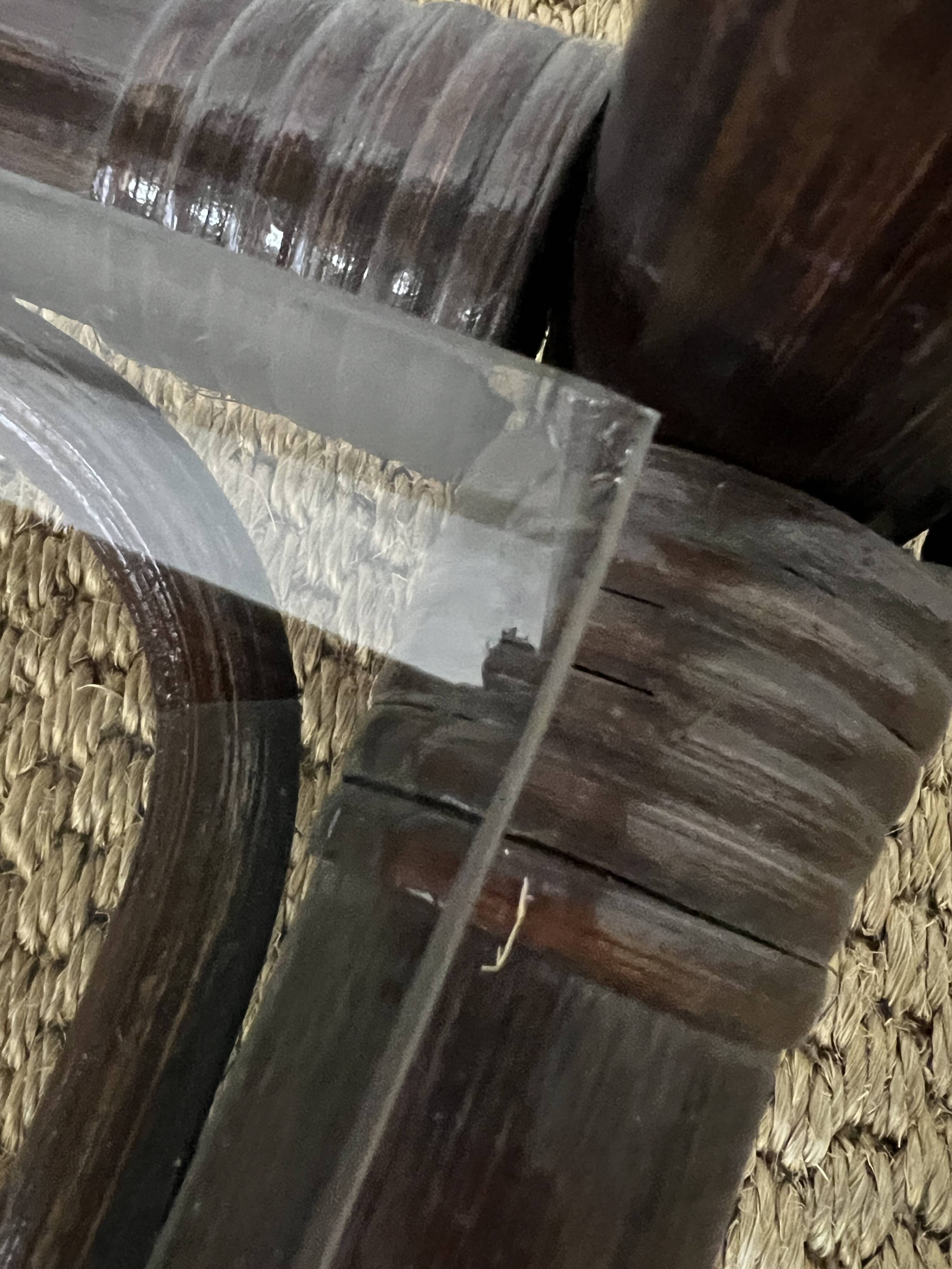 Rattan and smoked glass bookcase shelf