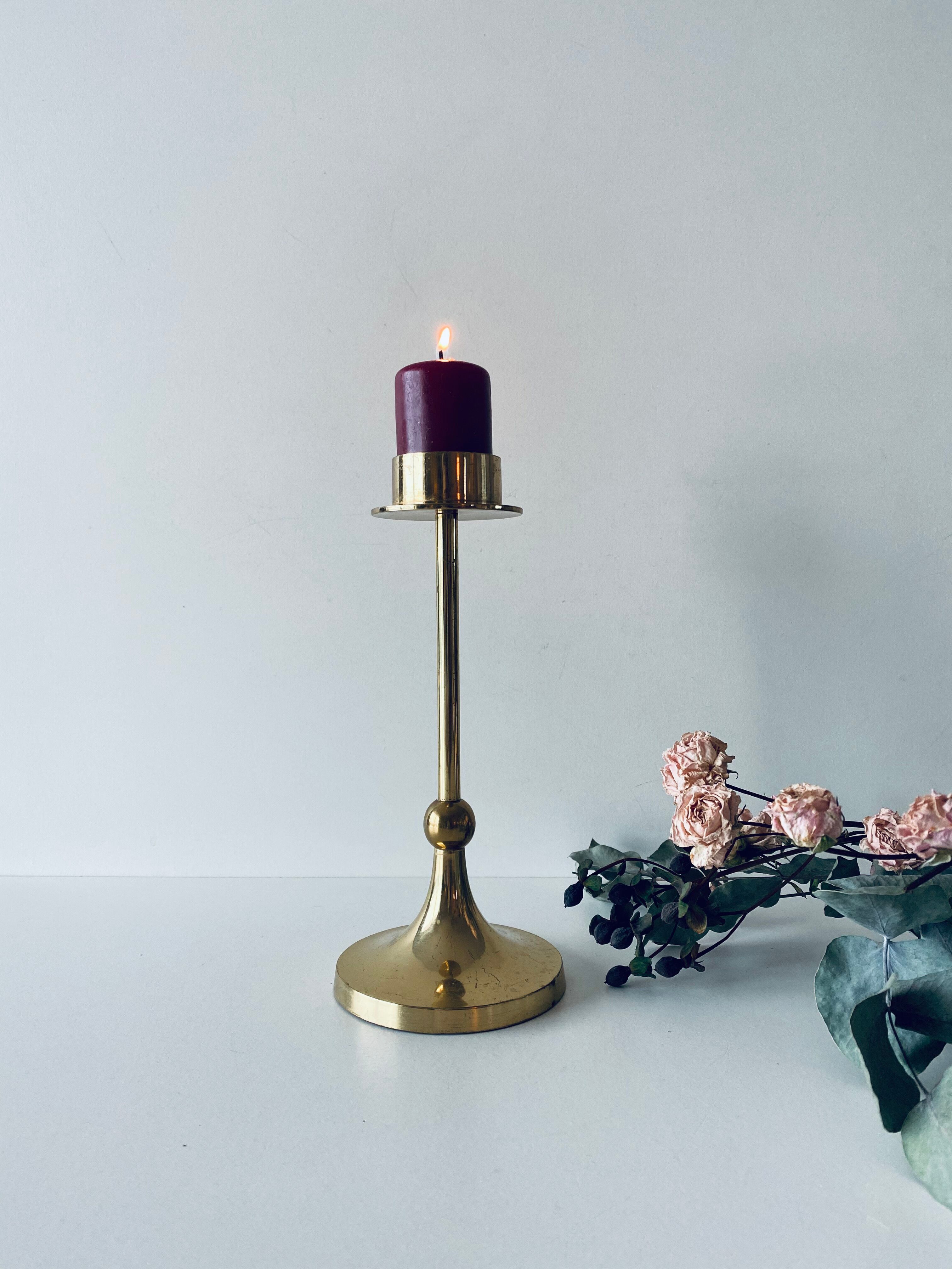 Golden brass candle door