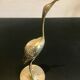 Couple of brass birds