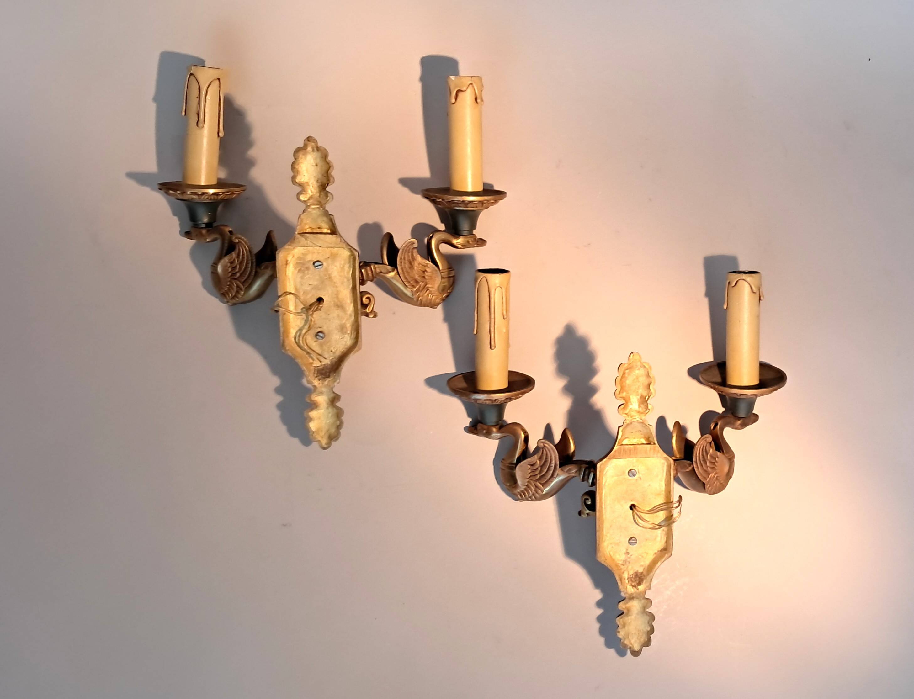 Pair of gilded bronze and green lacquer wall sconces by Maison Lucien Gau, Paris.